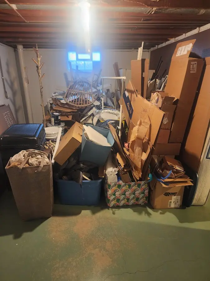 Roll-off dumpster container at job site for 15 Yard Dumpster Rental in Mathis